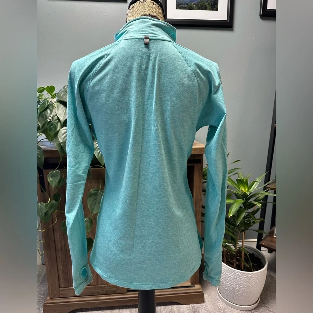 Nike Element dri fit light teal 1/2 zip up running top with thumb holes. Size S.